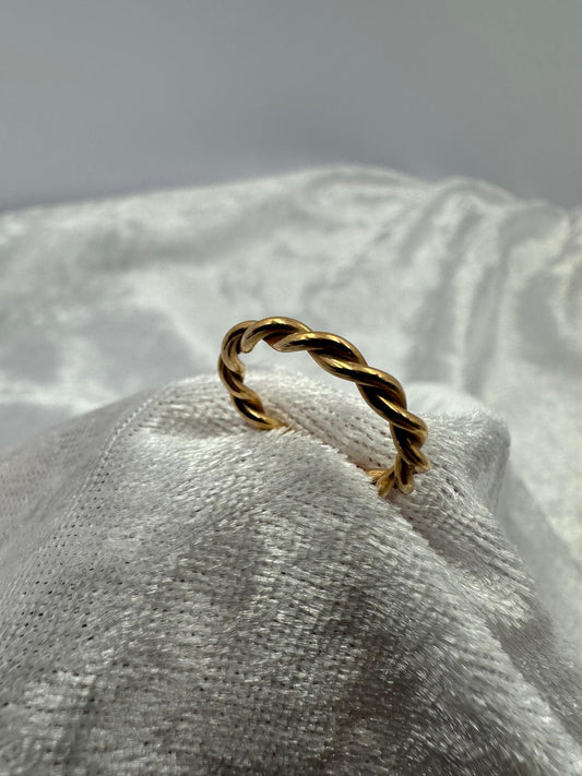 18K Rose Gold Twist eternity ring.