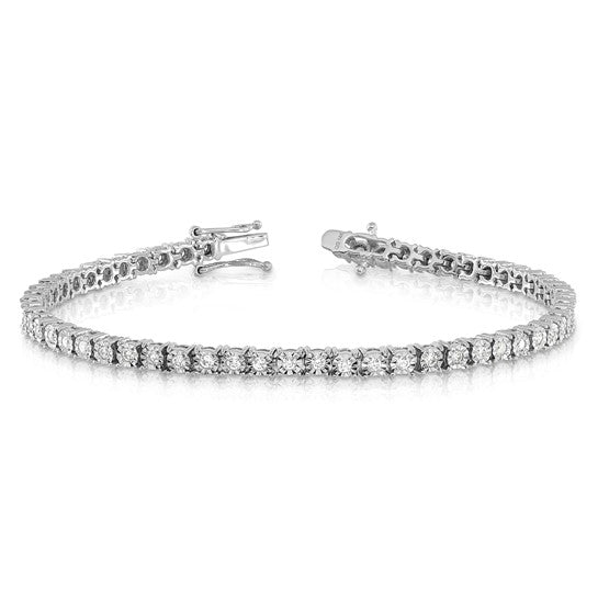 Illusion set diamond tennis bracelet.