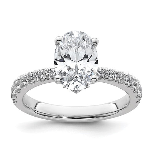 Hidden halo tapered diamond band engagement ring