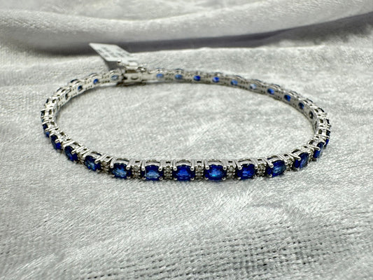 18K white gold Ceylon sapphire and natural diamond tennis bracelet. 7.30 TCW