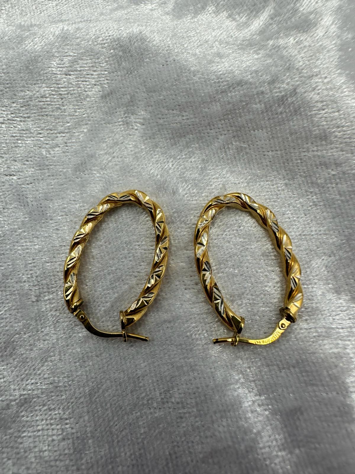 9K gold hoop earrings.